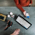 CPA reviewing AI-assisted accounting software with a small business owner