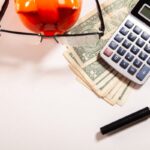 Business owner reviewing W-2 employee vs 1099 independent contractor classification documents