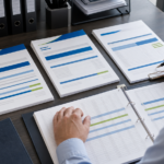 CPA preparing and reviewing monthly profit and loss, balance sheet, and cash flow statements