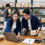 Online business team reconciling e-commerce orders and inventory